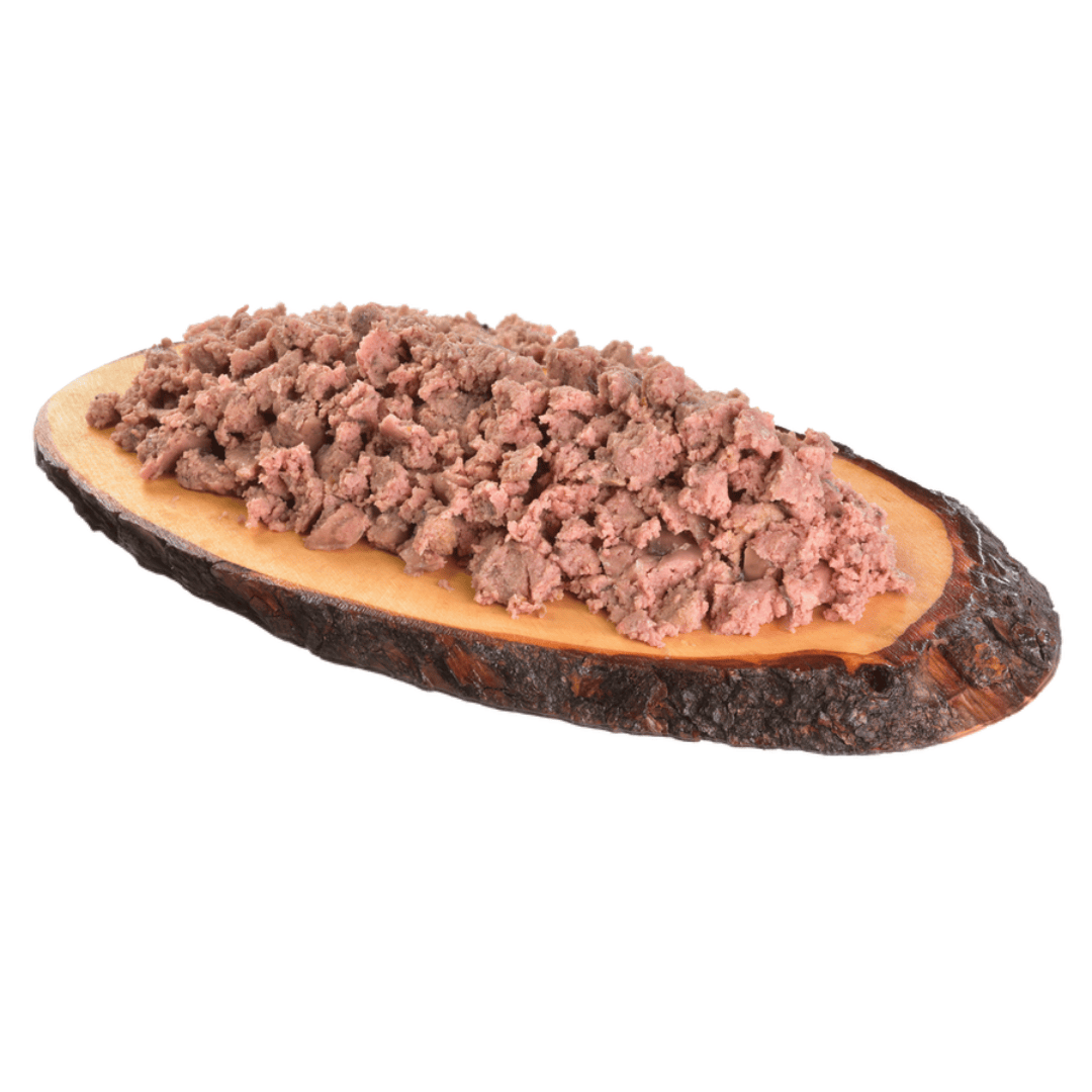 The Carnilove Duck with Timothy grass wet dog food served on a wooden dish has a chunky consistency with many different textures throughout.