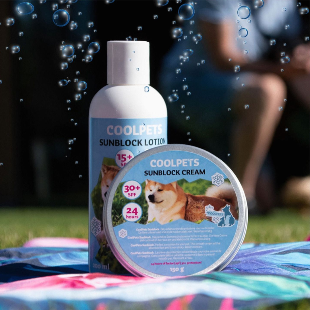 An image of the Sunscreen Lotion for Dogs 200ml and the Sunscreen Cream for Dogs 150g on a cooling mat. there is bubbles, a person and a dog in the background.