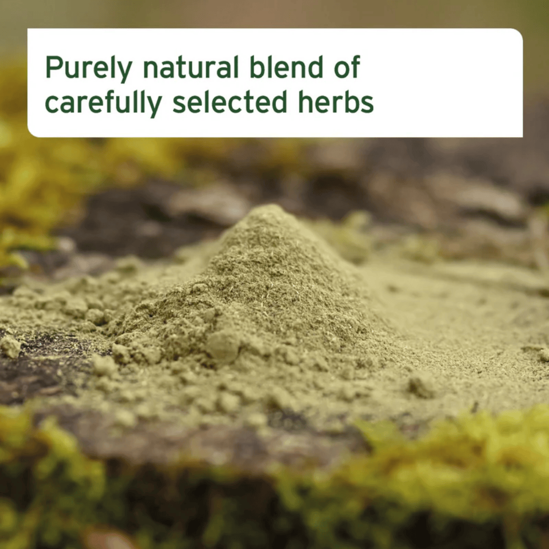 A pile of Aniforte Natural Herb Mix loose as a powder on display. It is displayed on a tree stump.