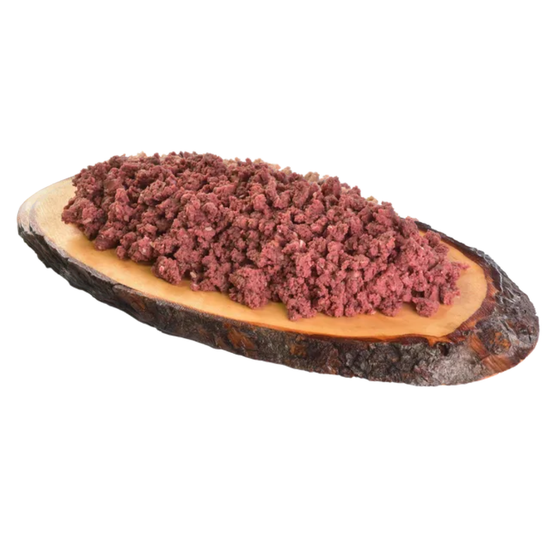 The Carnilove Venison with Strawberry leaves wet dog food served on a wooden dish has a finer mince like consistency.
