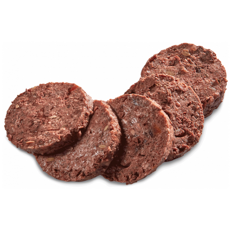 Country Hunter Wild Boar Dog Food Tin, the product has been removed from the packaging. It is chopped up into slices. You can see a meaty food with jelly like sections, and chunks of veg.