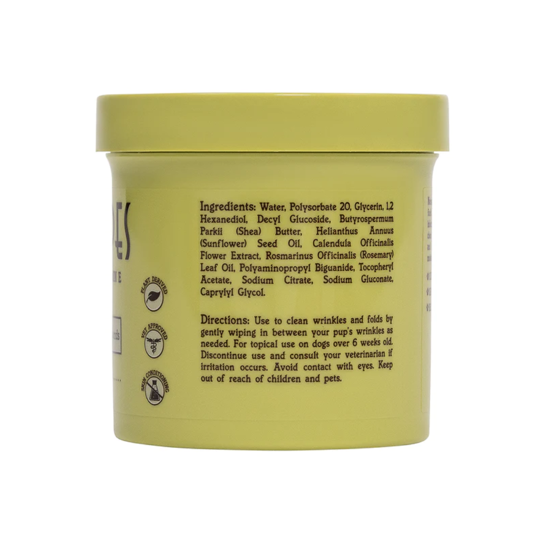 Side of a tub of The Natural Dog Company Wrinkle Wipes showing the ingredients and directions.
