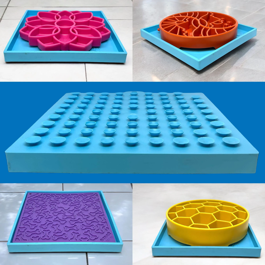 This image shows the bottom side of the SodaPup Hold'em Suction Cup Holder. You can clearly see the many suction cups to ensure security. There is also examples of types of Sodapup products that fit into it.