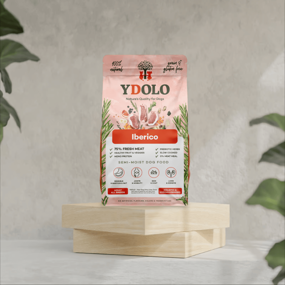 Bag of Ydolo dog food on a wooden platform.