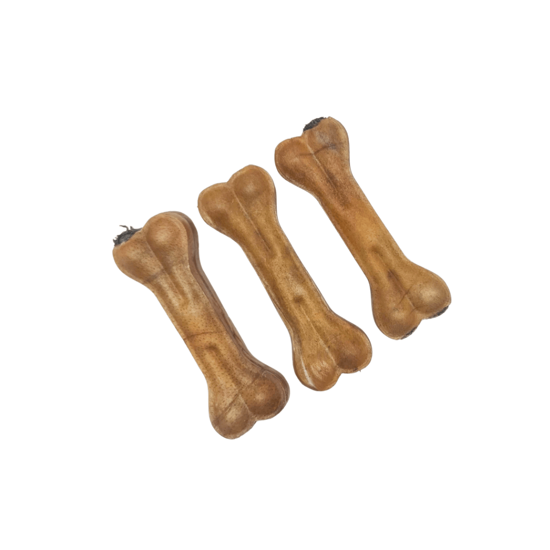 Three of the Atlas and Tail Tripe Filled Bones displayed on a White Background