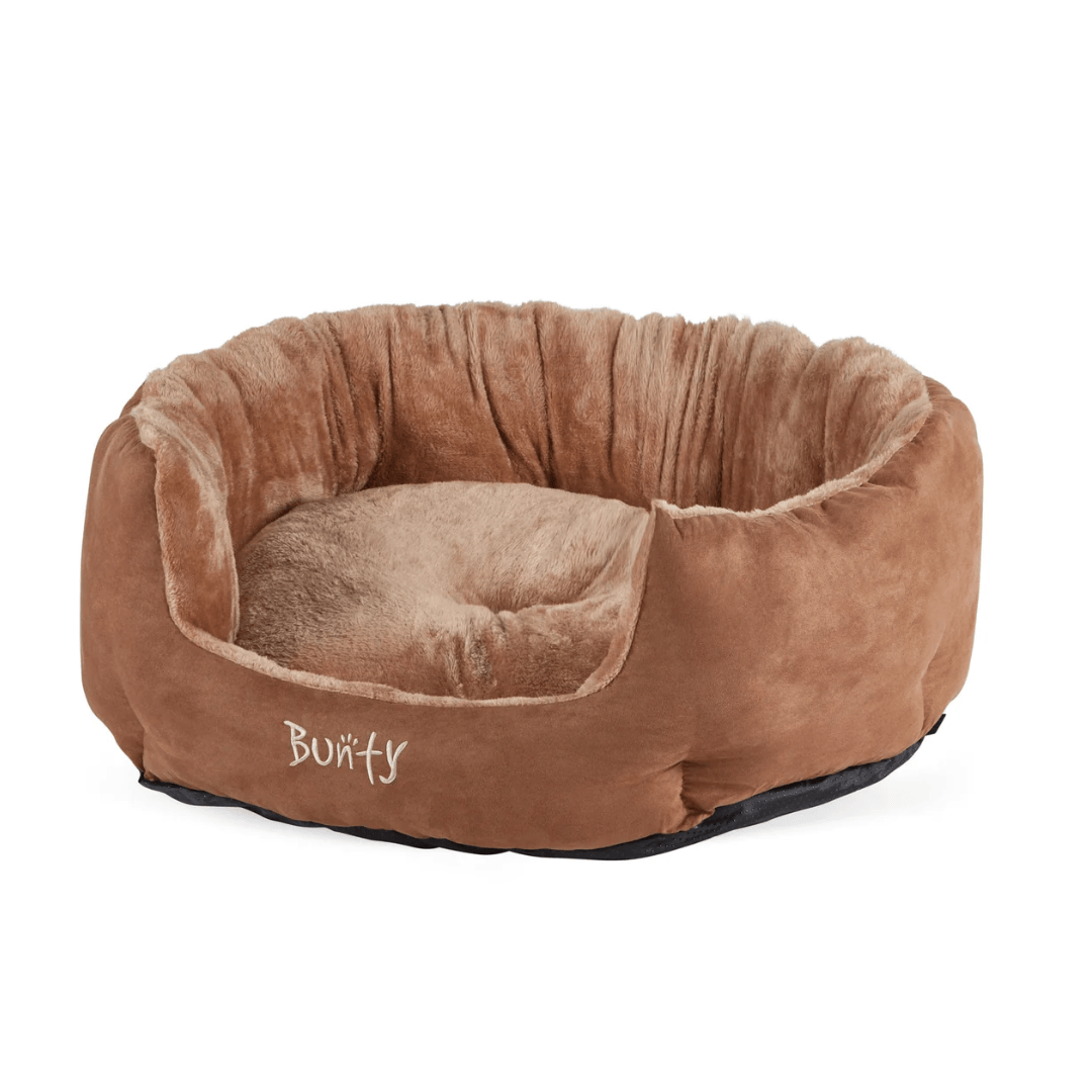 Brown pet bed with 'Bunty' branding on a white background