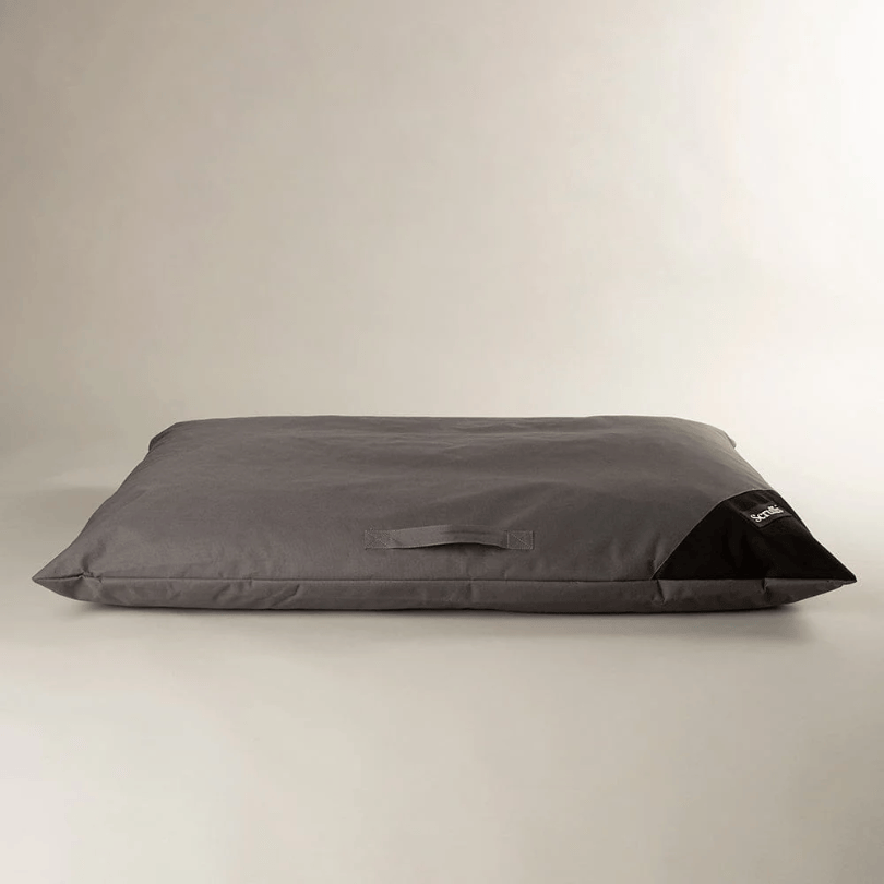 A grey Scruffs Expedition Orthopaedic Pillow for Dogs against a plain background