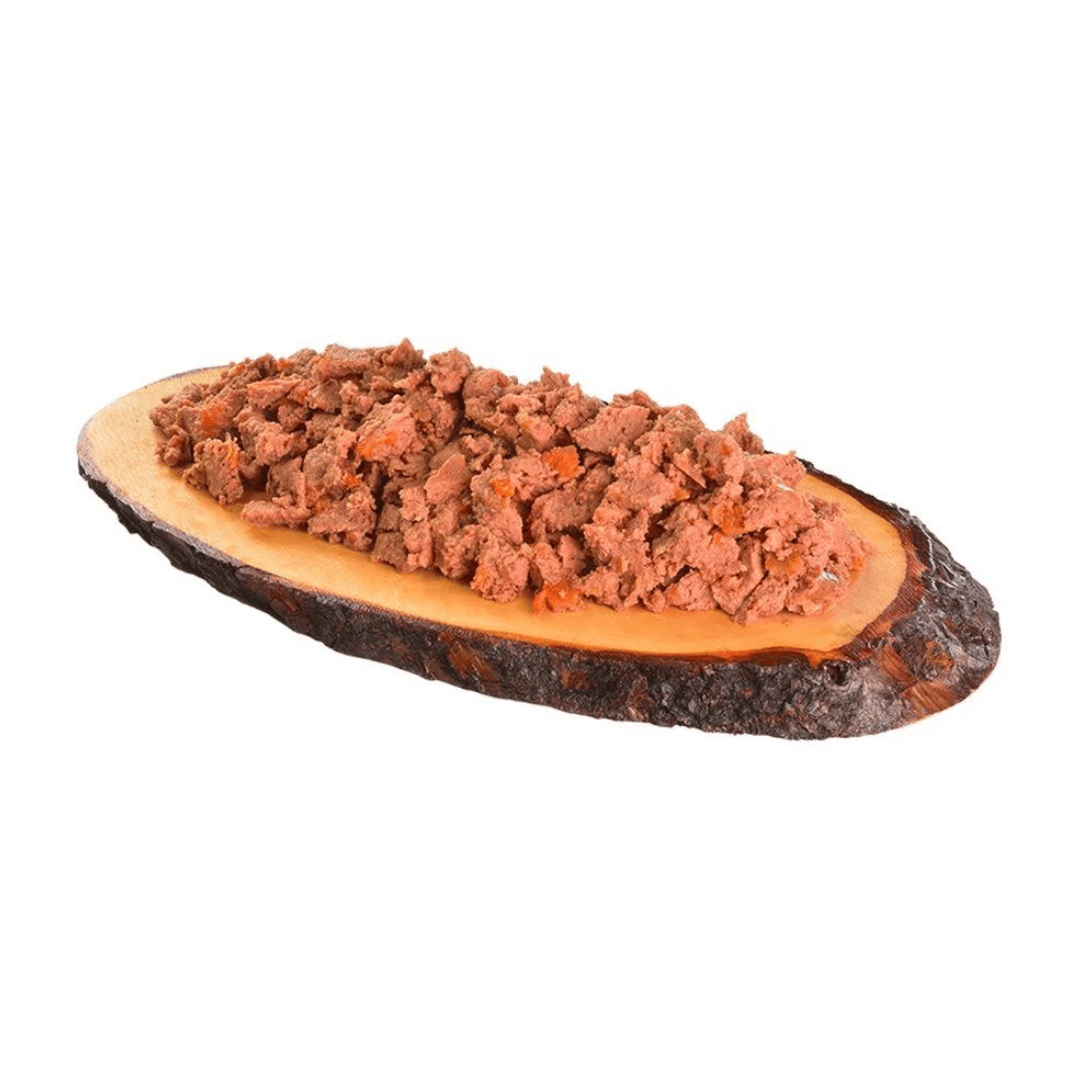 Quail and Yellow Carrot Wet food pouch on a wooden slab