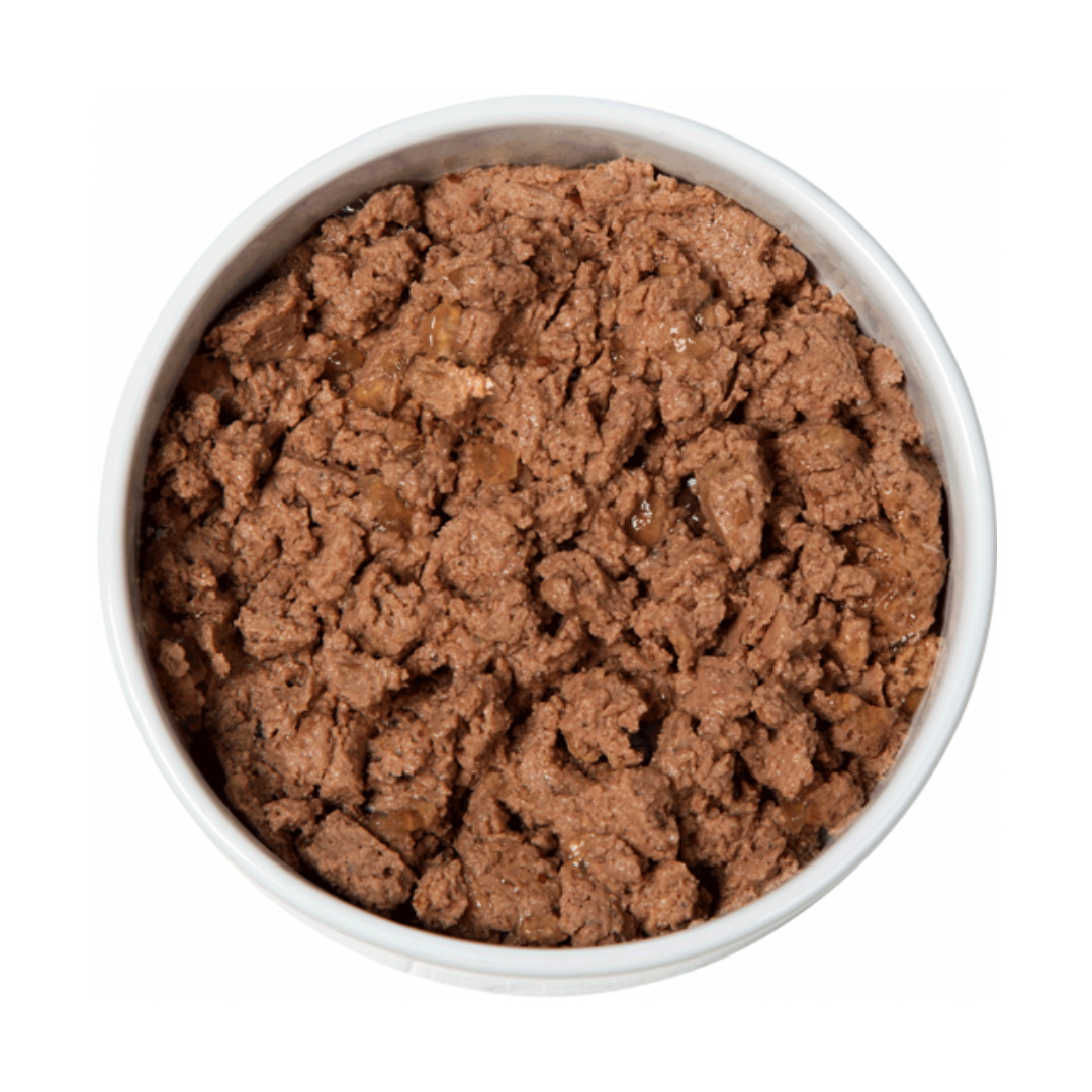 White ceramic bowl filled with Natures Menu Chicken and Beef wet food for cats