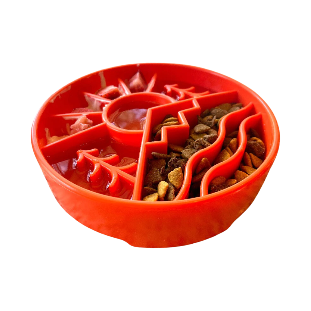 Sodapup Great Outdoors Slow Feeding Bowl in orange with an aray of foods and liquids in each compartment.