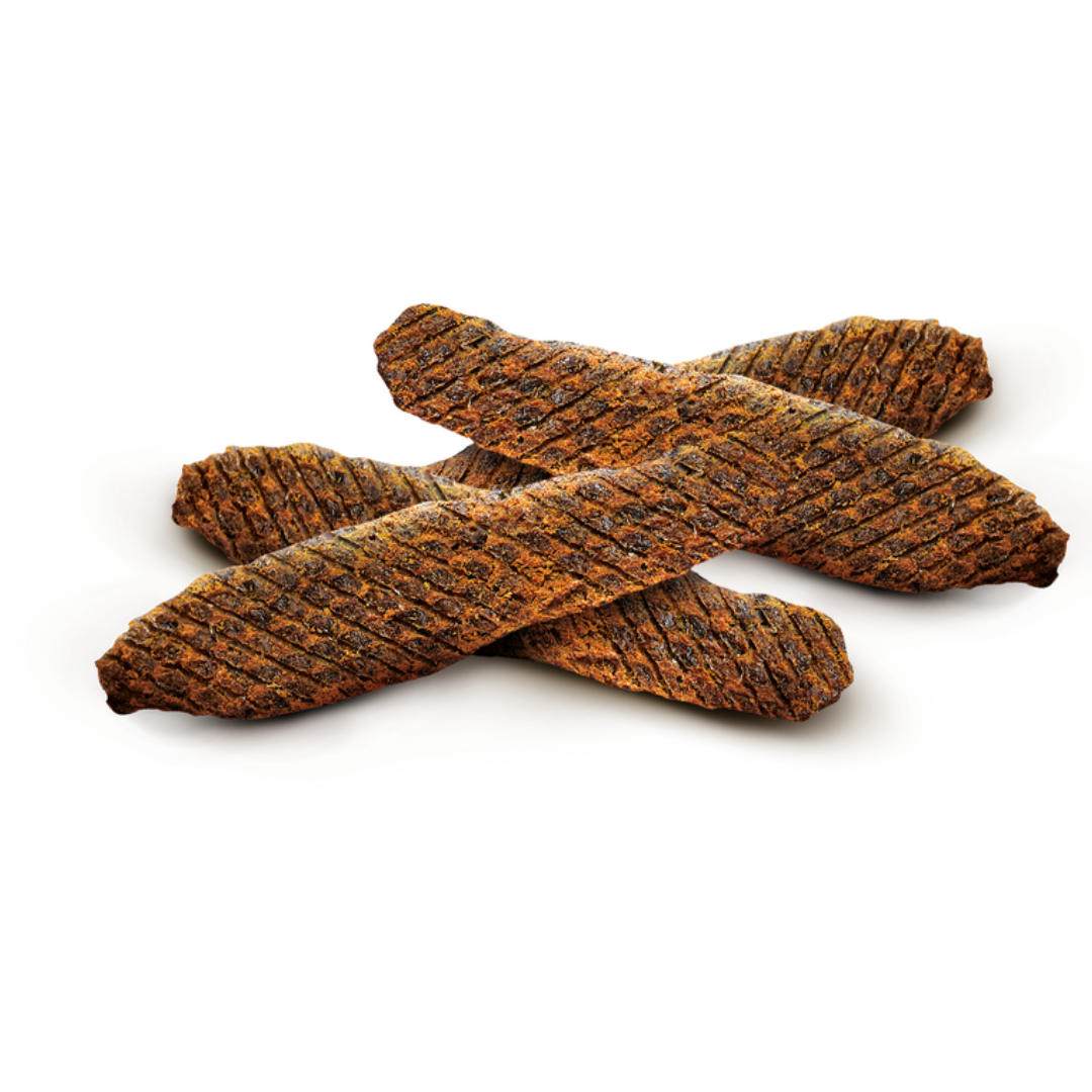 Carnilove Duck with Herring Meat Jerky  loose on display against a white background.