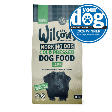 Bag of Wilson's Working Dog Cold Pressed Dog Food with a dog on the packaging and a blue award badge.