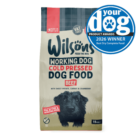 Bag of Wilson's Working Dog Cold Pressed Dog Food with a dog on the packaging and an award badge on a white background.