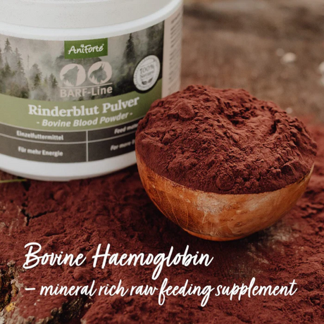 The contents of Aniforte Blood Powder in a brown bowl and beside a full tub, alongside text saying "Bovine Hemoglobin - mineral rich raw feeding supplement"