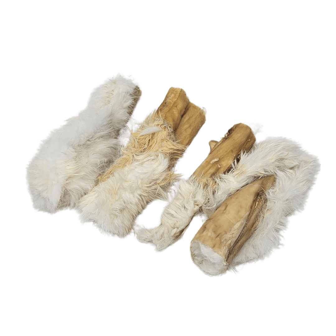 four dried furry rabbit strips or skin