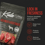 Kudo red meat and vegetables pet food package with text highlighting freshness features on a black background