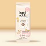Luminoble cleansing puppy wipes packaging on a beige background