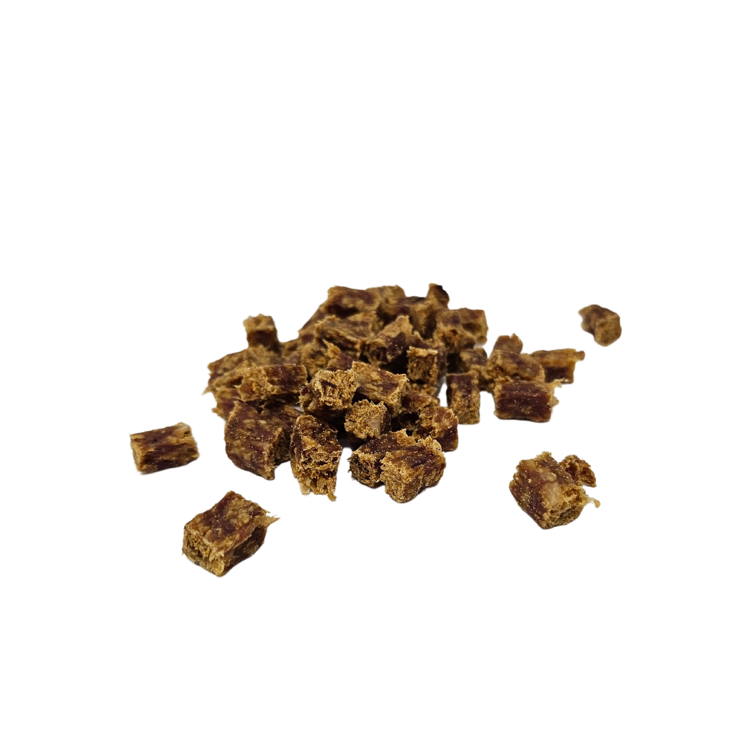 Small pieces of rabbit cubes on a white background