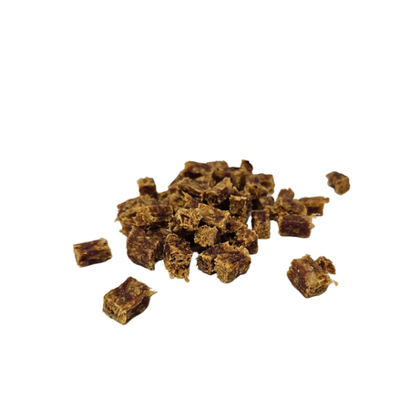 Small pieces of rabbit cubes on a white background