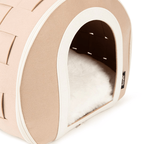Beige pet bed with white interior on a white background