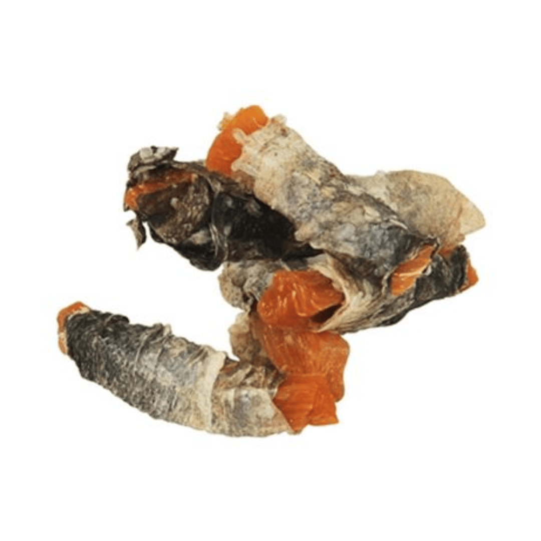 A pile of Fish 4 Dogs Sweet Potato Fish Wraps on a white background.