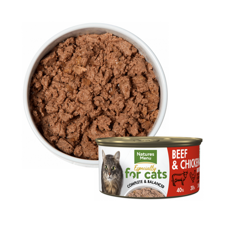 Tin of Natures Menu Chicken and Beef Cat food in front of a ceramic bowl of the same food.