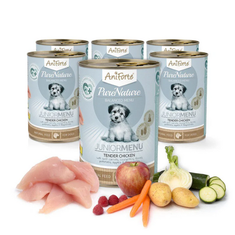 Six tins of AniForte Junior Tendeer Chicken wet puppy food behind the raw ingredients.