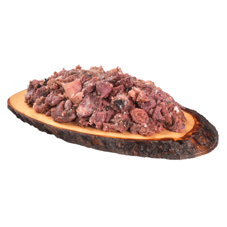 The Carnilove Venison & Reindeer wet dog food served on a wooden dish has a chunky consistency with many different textures throughout.