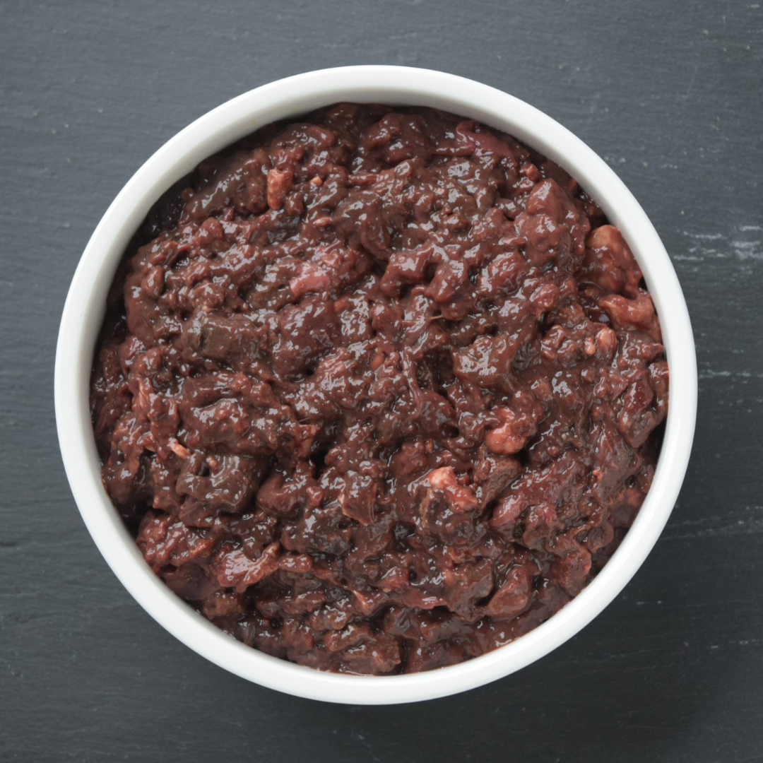 Minced Barkin Bistro Raw Venison Liver in a white dish.