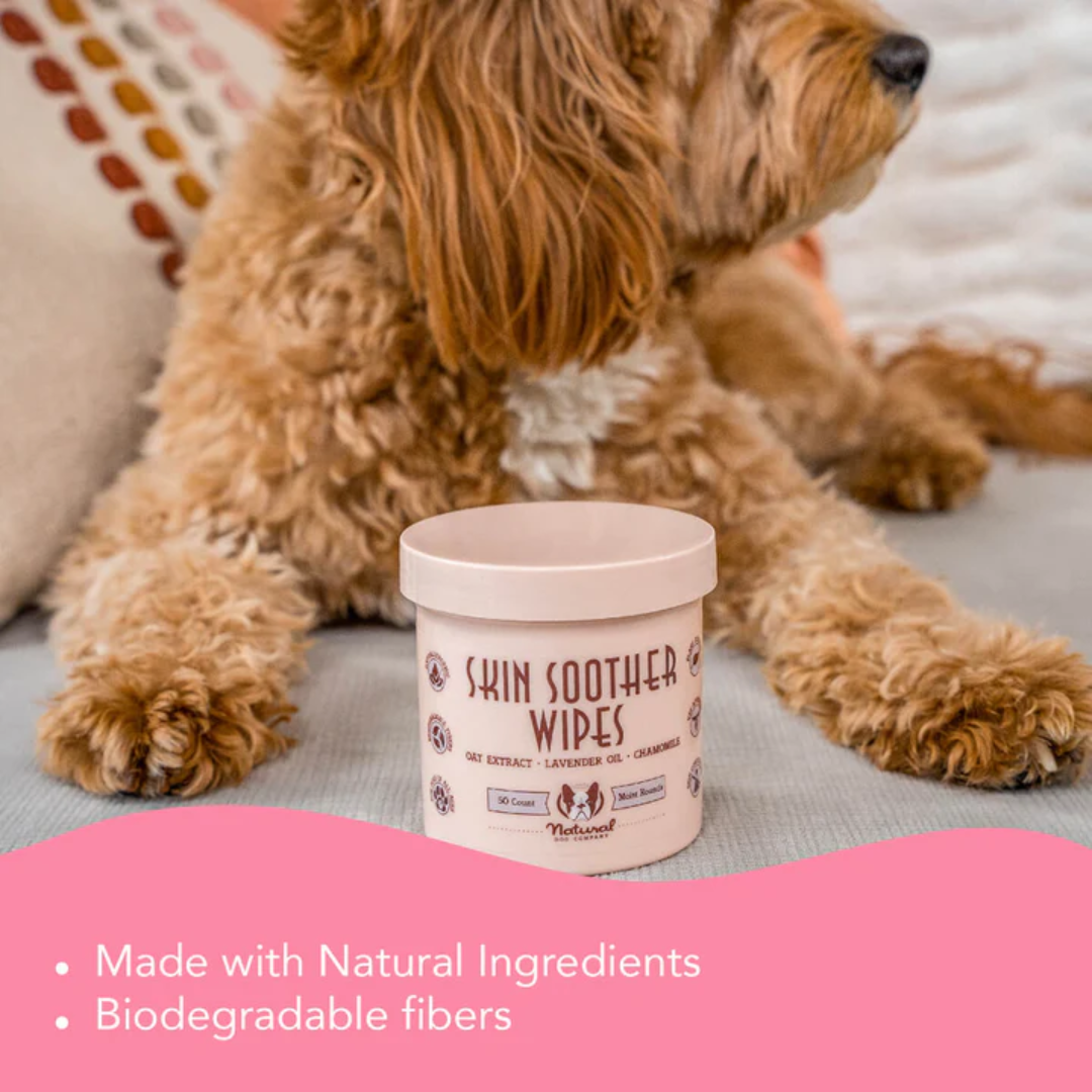 Brown dog with a tub of Natural Dog Company between their front legs, above text saying "Made with natural ingredients, biodegradable fibres"